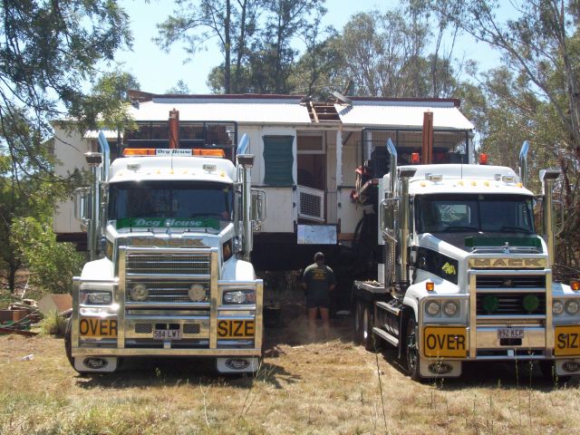 Two Mack Superliners moving a house in Australia