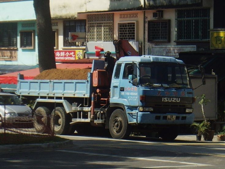 Thong Timber Merchant Pte Ltd CXZ 71J Isuzu Skid Dump Truck
