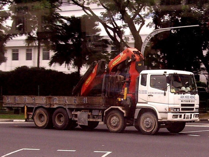 FU519UZ 4-axle Mitsubishi Fuso Cargo Truck with a Pal Finger hoisting crane belonging to Aik Hoe Heng Construction Engineering Works