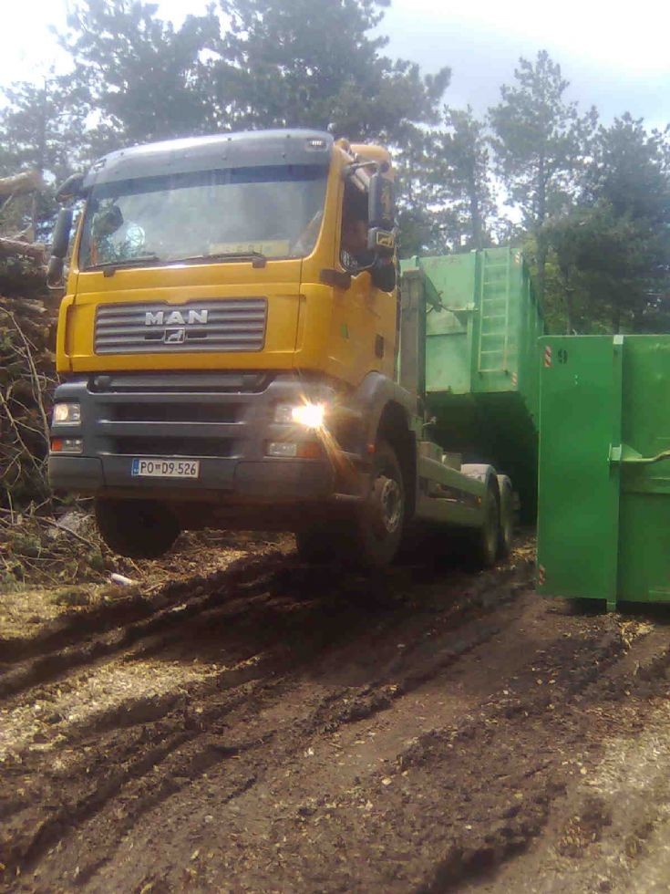 MAN Sky hi, loading wood chips in Slovenia