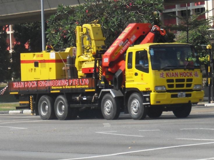 Kian Hock Engineering Pte Ltd 4-axle Isuzu Giga CXH cargo truck with a heavy duty Pal Finger hoisting crane
