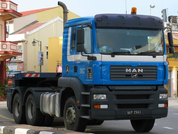 MAN TGA 33.400 with 4-axle low-loader