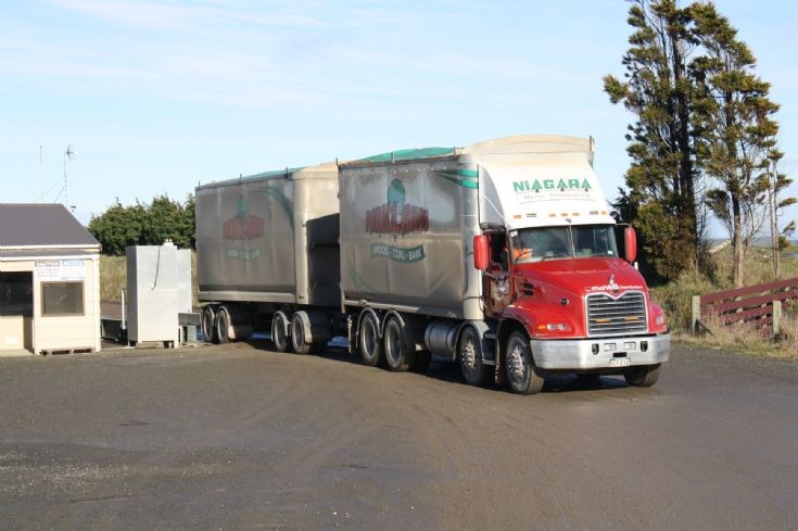Mack Vision at the weight bridge at South-Wood Export Ltd wood chipping plant
