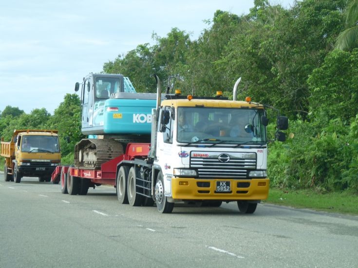 Megalift Heavy Machinery Hino profia with Kobelco excavator load
