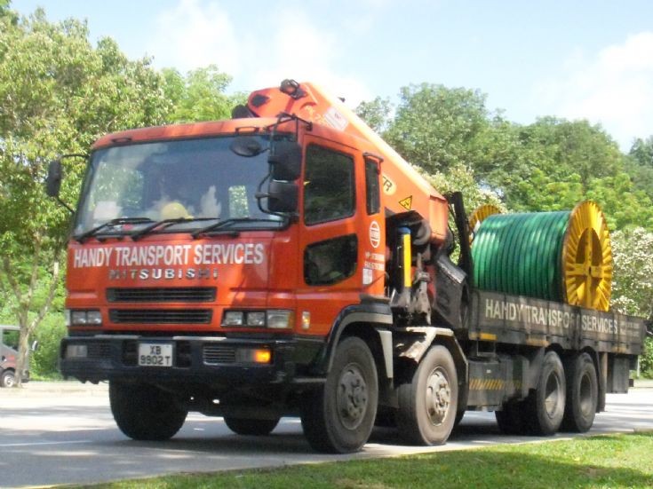 Handy Transport Services Pte Ltd Mitsubishi Fuso Super Great FU519 4-axle Cargo Truck