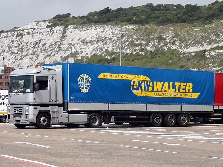 W Walter Internationale Transportorganisation AG trailer headed by a silver Renault