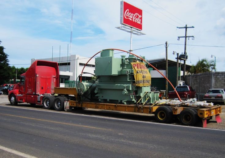 Oversize load Kenworth truck with low loader