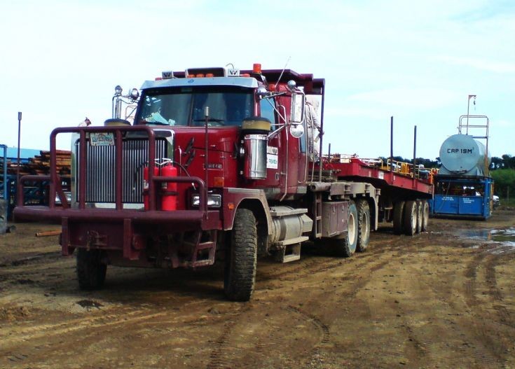 Western Star truck transporting oil equipment