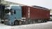 A DAF XF 105 410 container trailer seen during heavy snow in Nootdorp, The Netherlands
