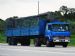 Mitsubishi Fuso Great FP419 Tractor hauling a cargo trailer with timber side wall boards..